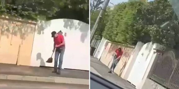 (VIDEO) Val de ironii după ce Klaus Iohannis a fost filmat în timp ce mătură trotuarul în fața casei sale din Sibiu: „La Cotroceni a curățat de bani” / „Nu mai sunt bani de avioane private”